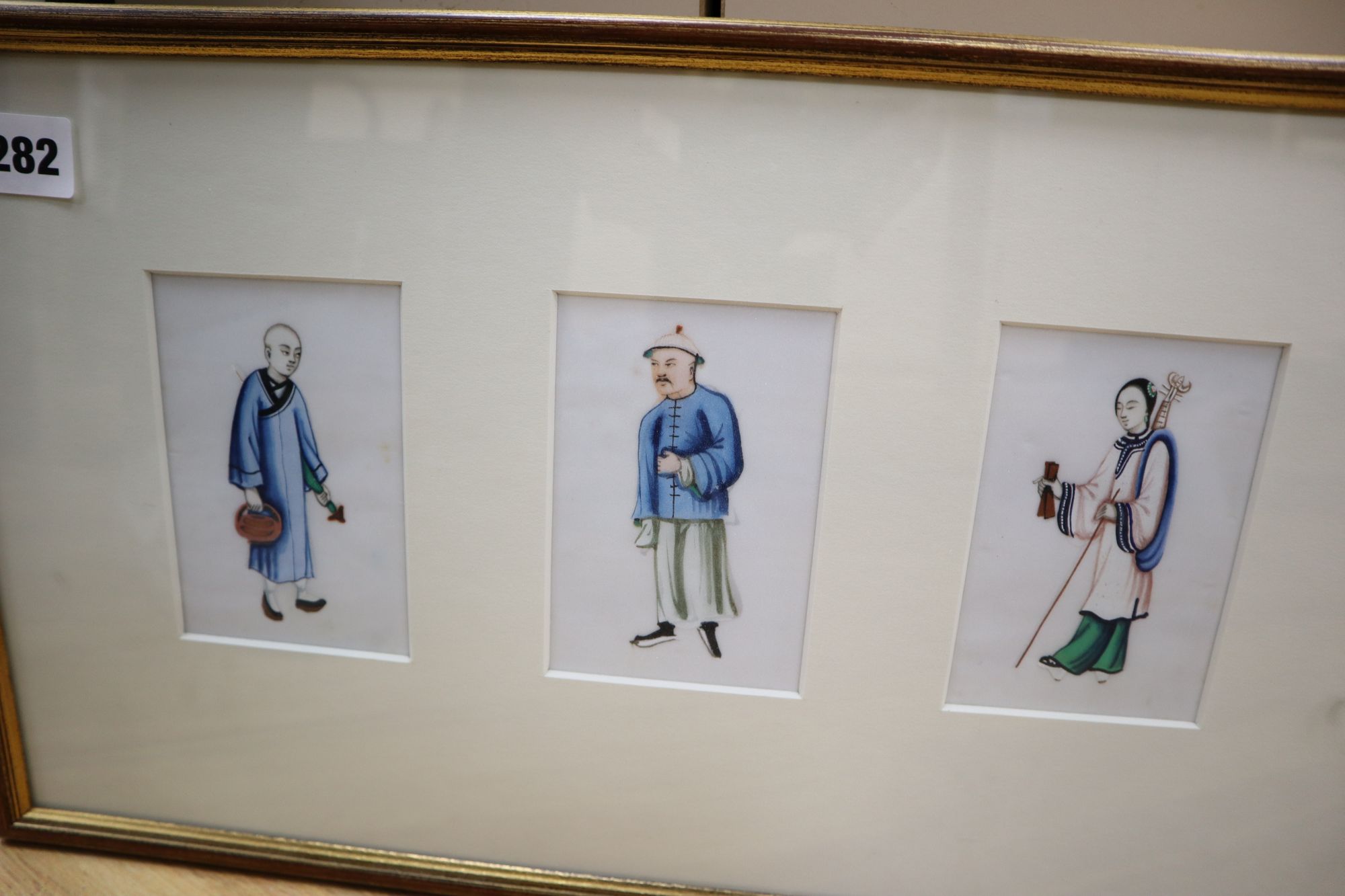 A pair of framed Chinese rice paper portrait groups and a pair of Chinese needlework sleeve bands, 60 x 16cm